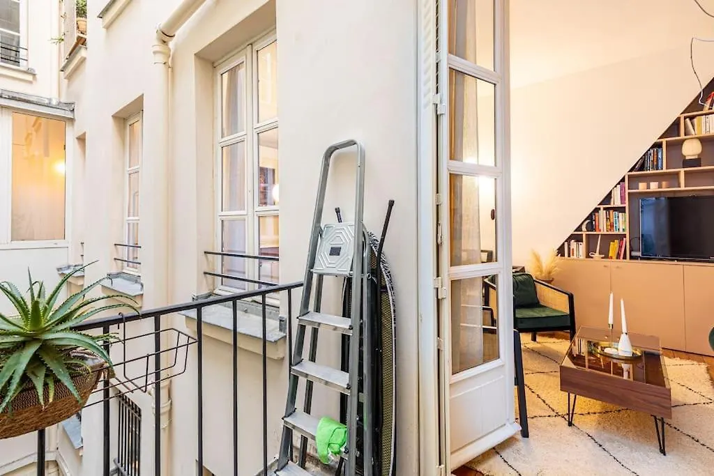 Chic Parisian Haven: Designer In The Heart Of